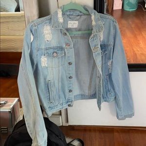 Light distressed denim jacket